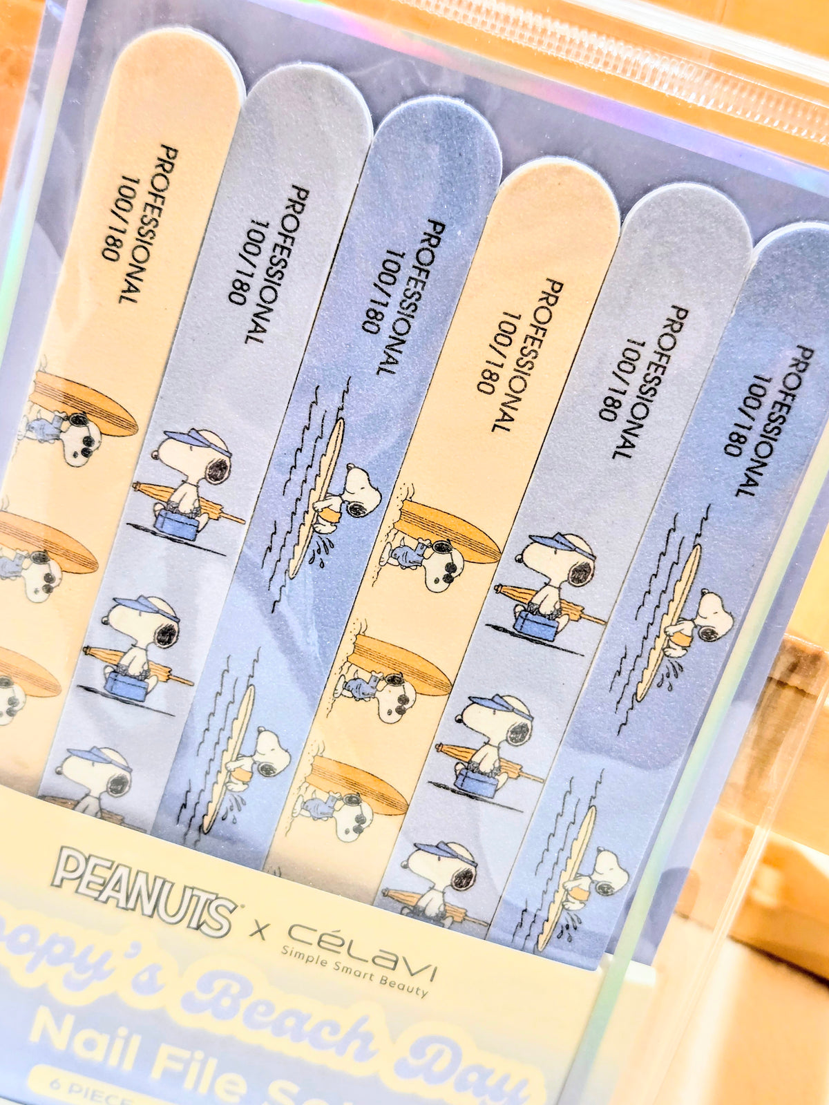Nail file set assortment in clear packaging with Snoopy-themed file strips