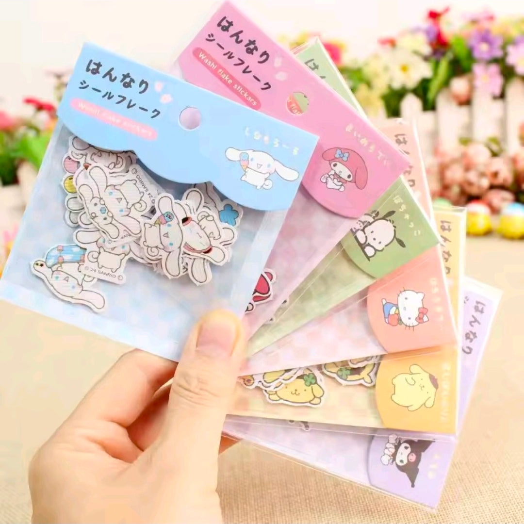 Assorted washi flake sticker sheets, multiple pastel character packs in plastic sleeves