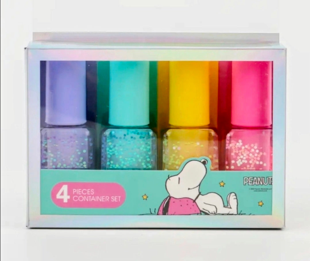 Peanuts 4-piece glitter highlighter container set with four capped bottles in box.
