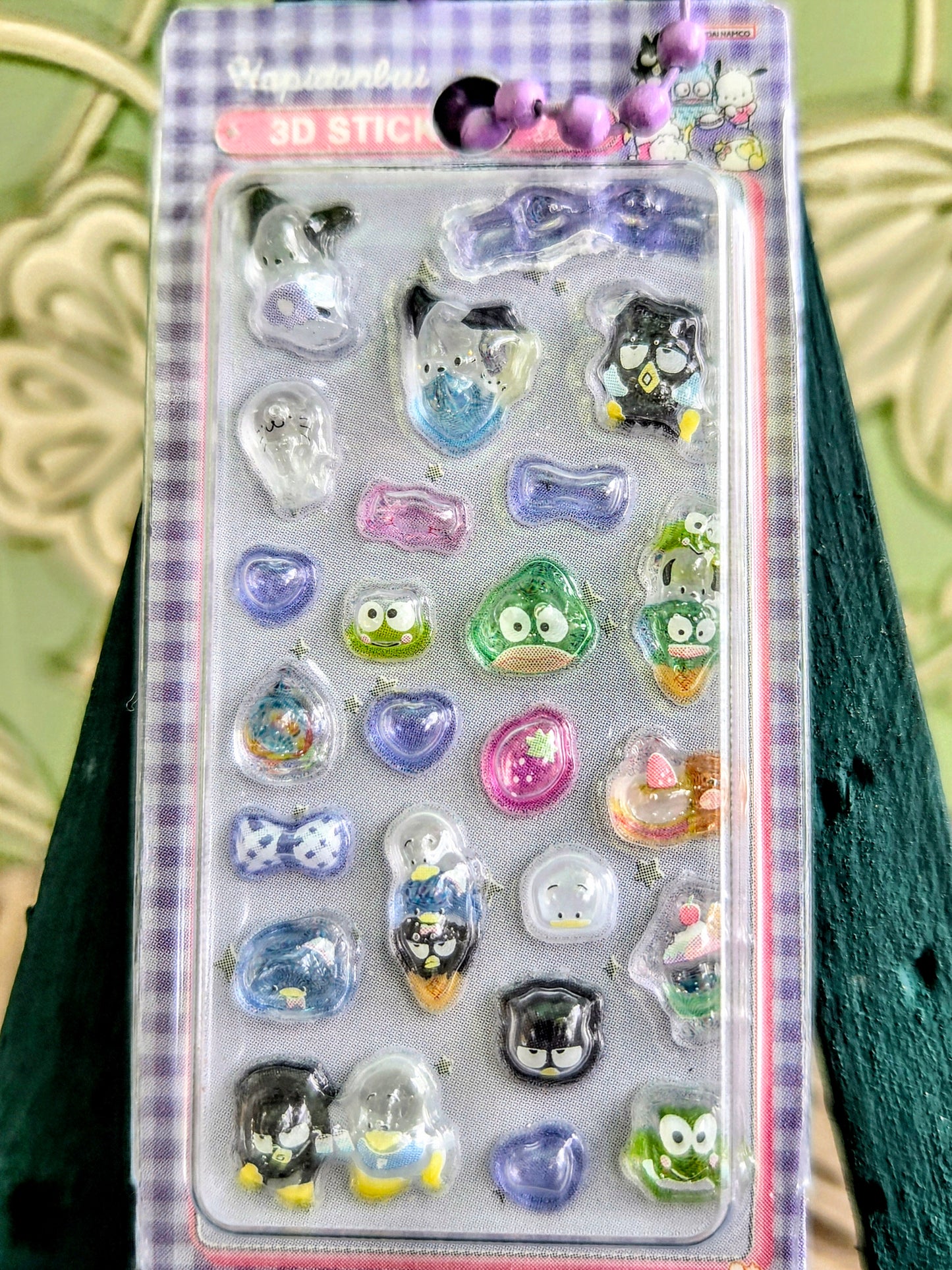 3D sticker keychain set card with clear blister showing green, blue, pink, and heart charms.