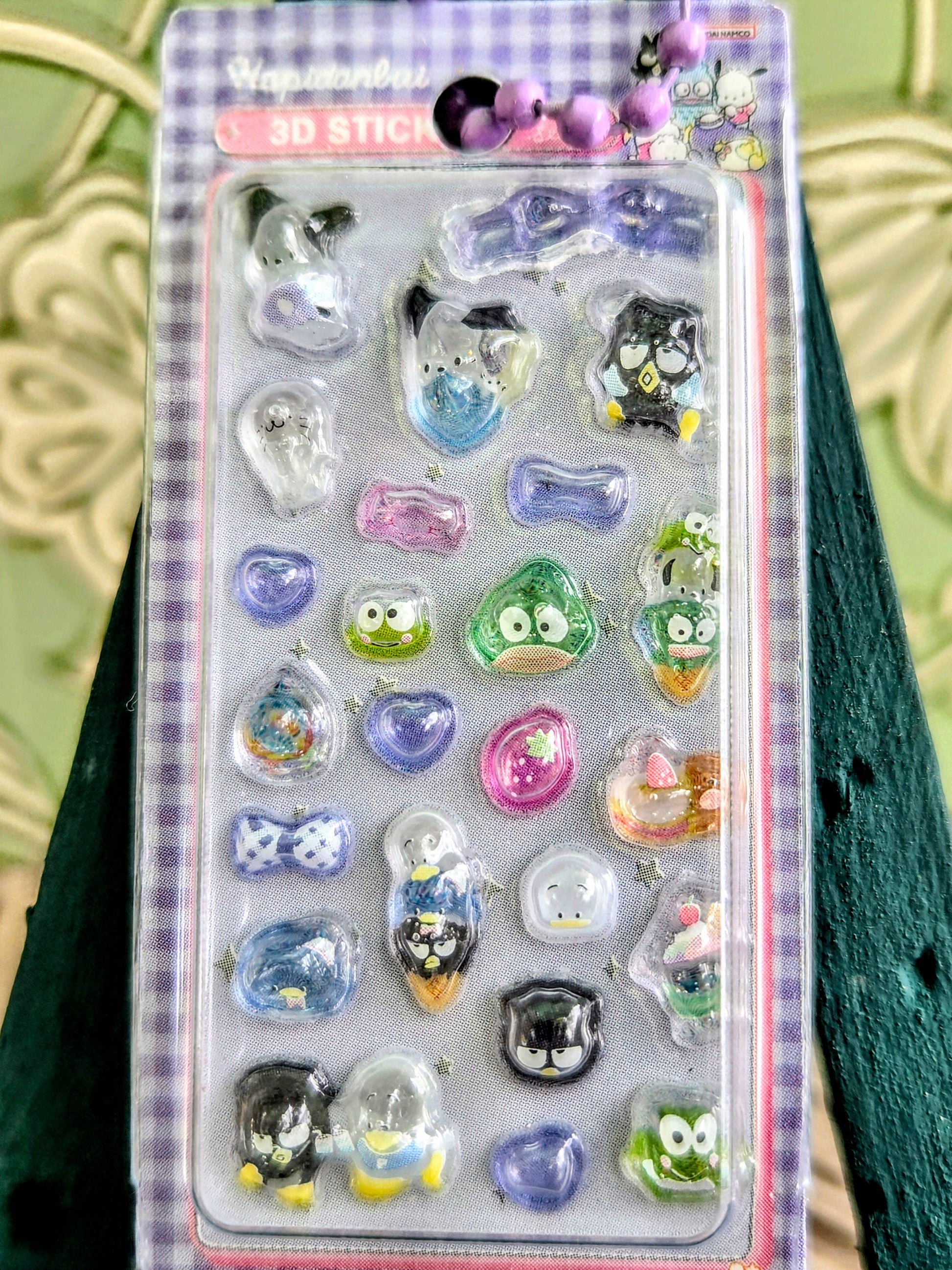 3D sticker keychain set card with clear blister showing green, blue, pink, and heart charms.