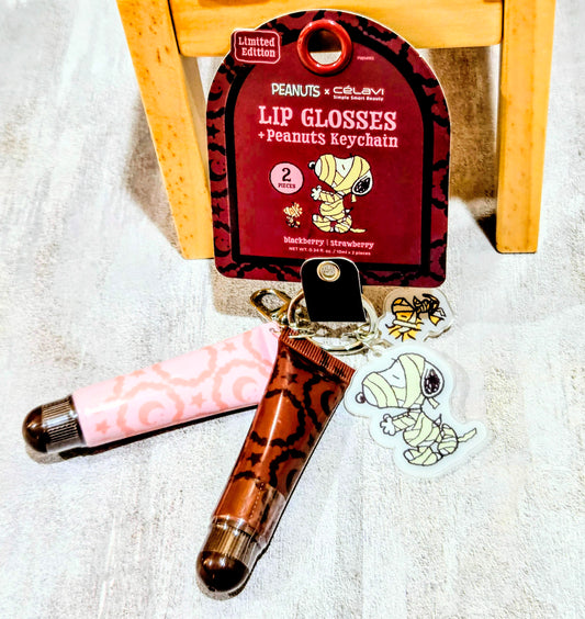 Halloween lip gloss set with keychain, two tubes, and Snoopy sticker charms