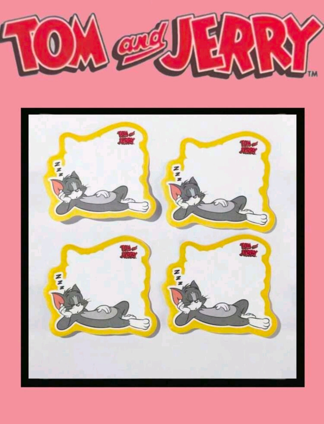 Die-cut sticky note pad showing four sleeping Tom die-cut notes with yellow border