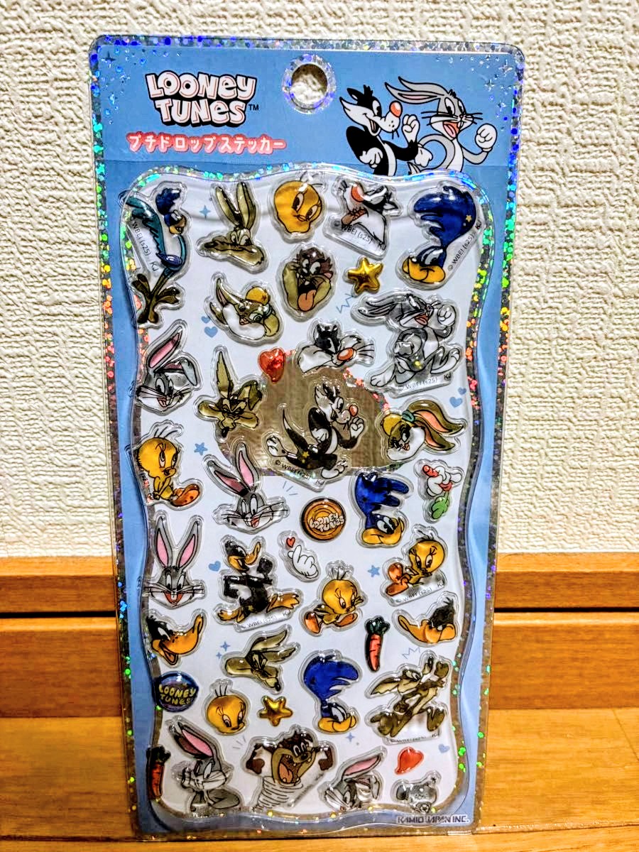 Looney Tunes 3D acrylic sticker sheet with blue border and many character icons