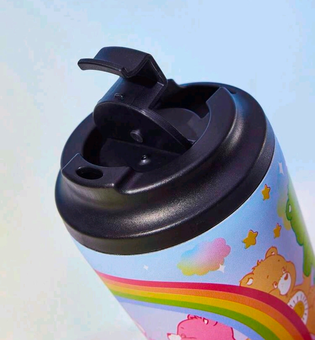 Care Bears rainbow insulated tumbler with black flip lid, close-up of lid opening