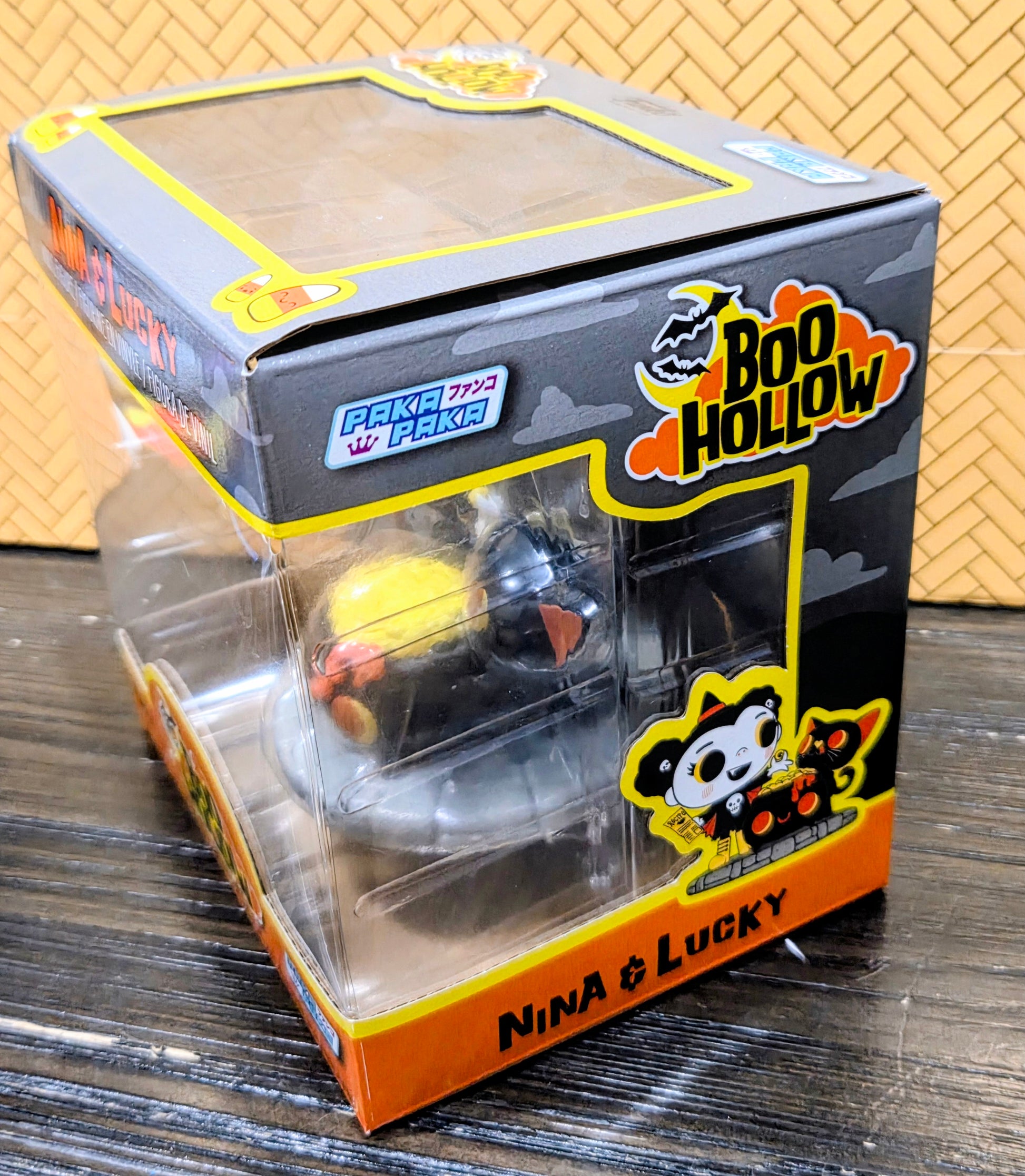 Funko Boo Hollow deluxe box corner, clear window with Nina & Lucky graphic and Lucky label