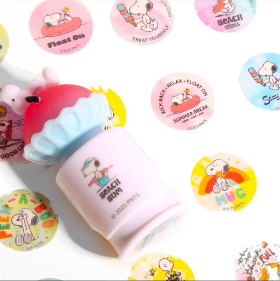 Pink and light-blue stamp roller with Snoopy beach-themed round stickers