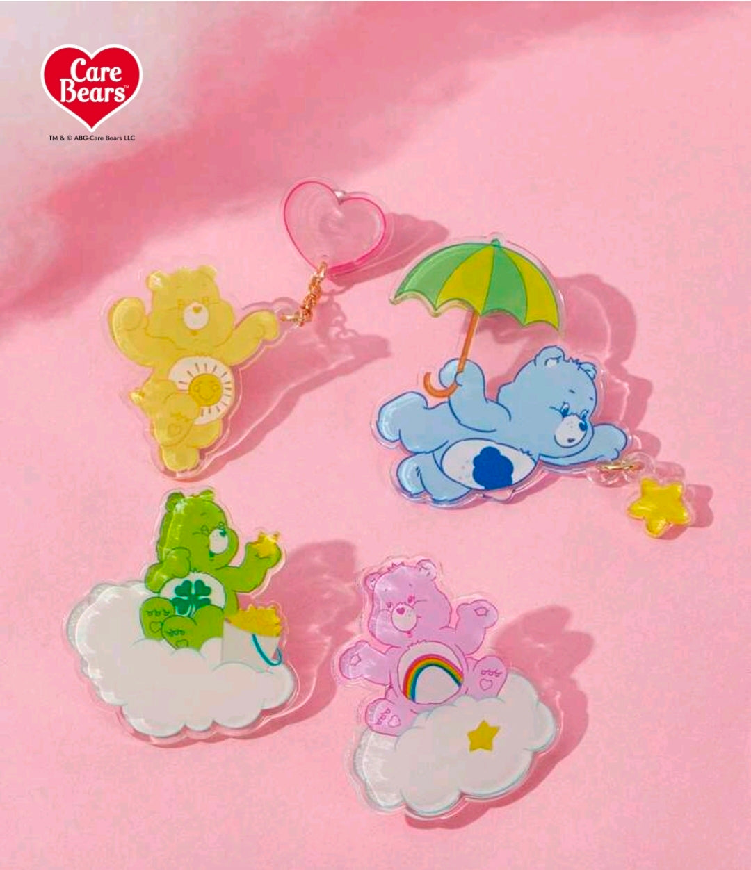Acrylic cascading bear brooch pin set with green, blue, and pink bears on clouds and stars