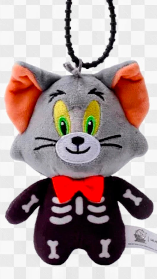 Grey plush cat skeleton keychain with green eyes, red bow tie and hanging bead chain