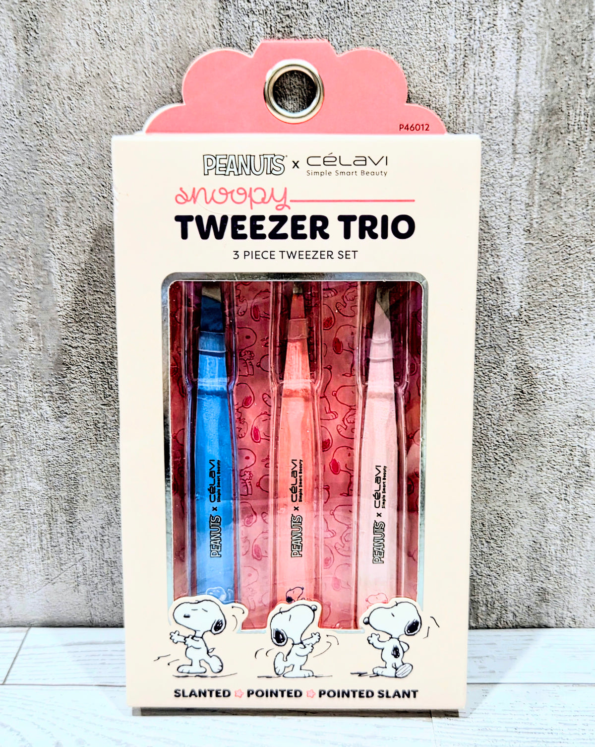 Tweezer trio box with window displaying red, blue, and pink tweezers