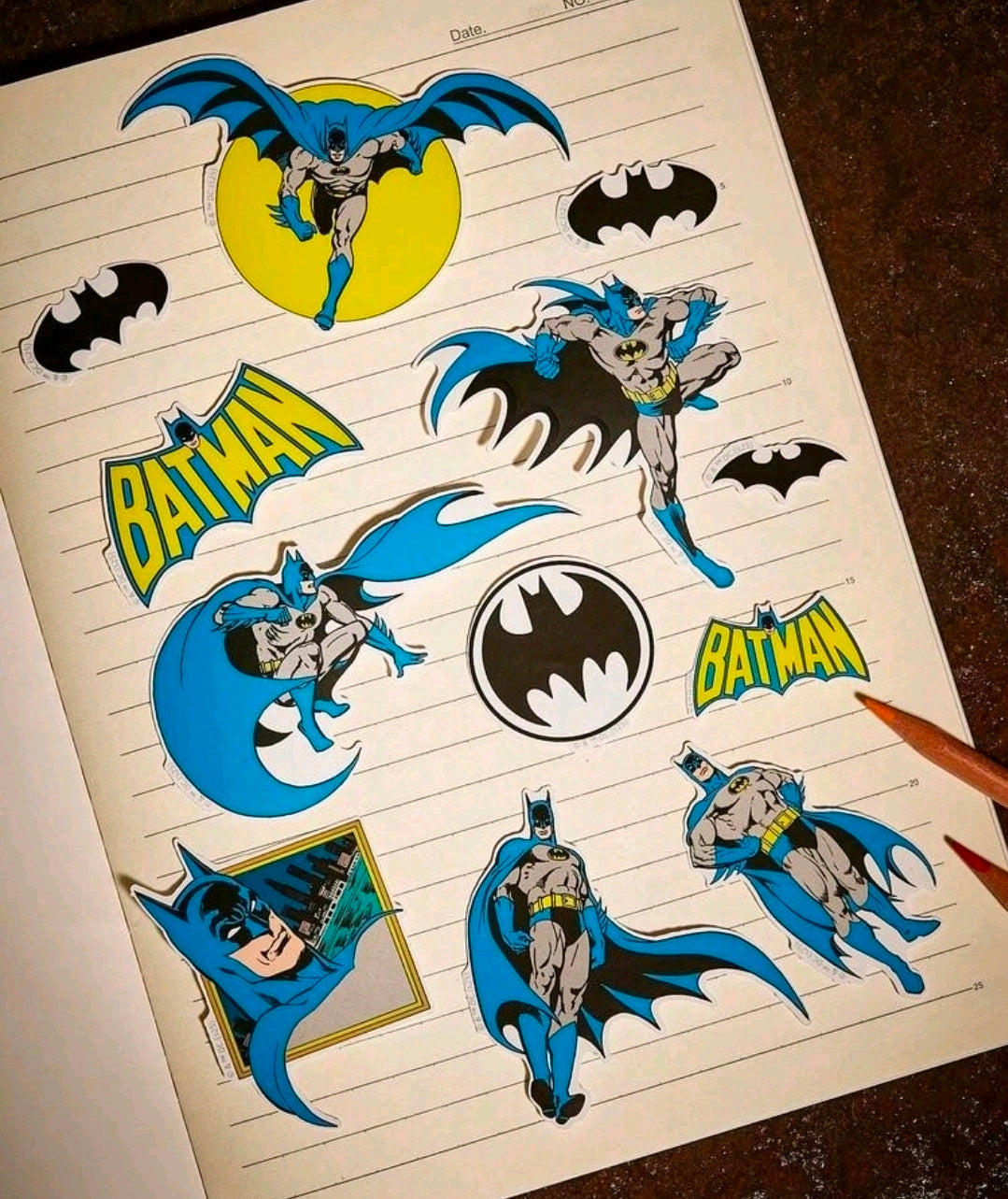 Batman decal sheet with illustrated heroes, bat symbols, and Batmobile