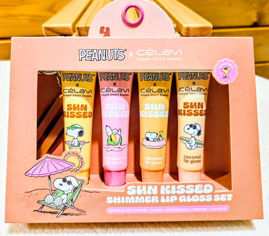 Retail lip gloss set package showing four Peanuts themed lip gloss tubes