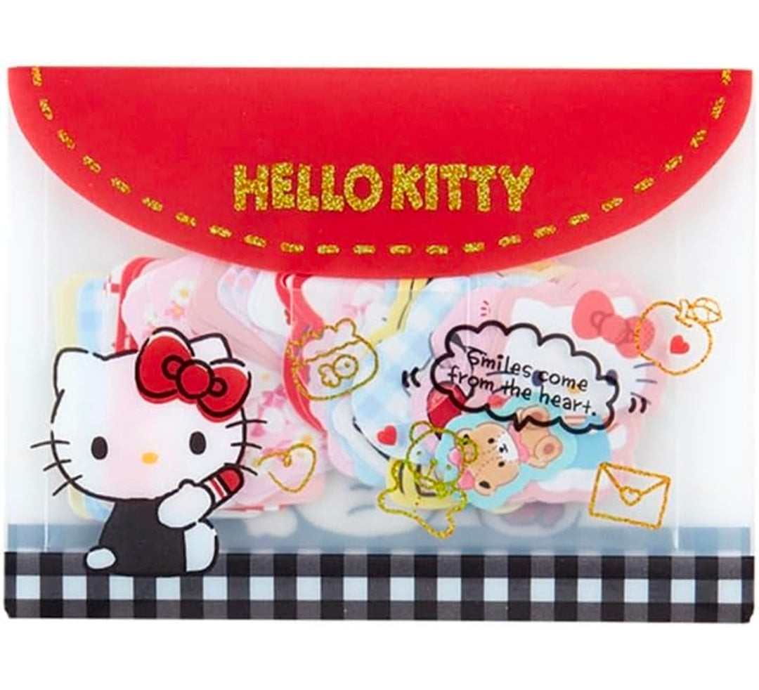 Hello Kitty die-cut flake stickers with red “HELLO KITTY” banner and character scene