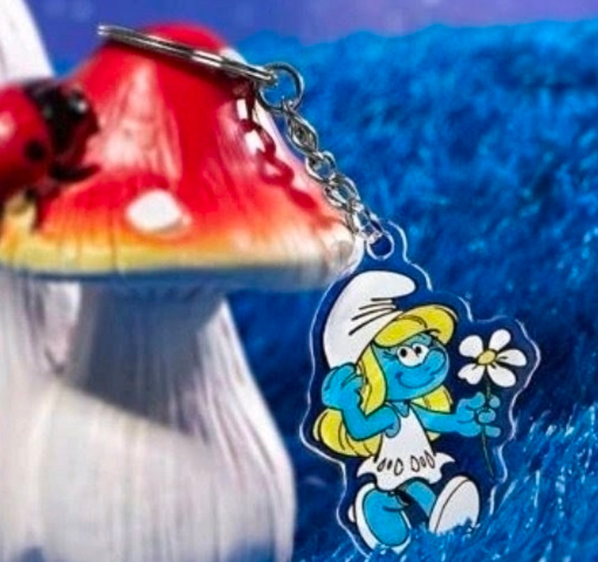Smurfette holding a flower acrylic keychain charm on silver chain