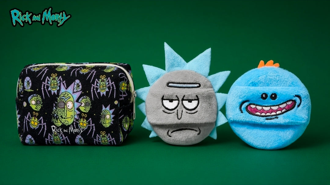 Character powder puffs beside black Rick and Morty makeup bag with all-over print.