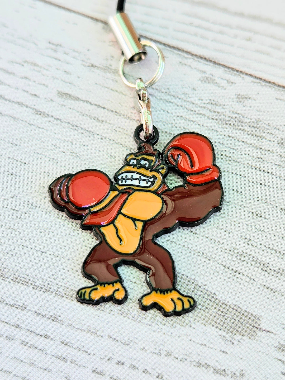 Donkey Kong enamel charm on metal keyring with red cap