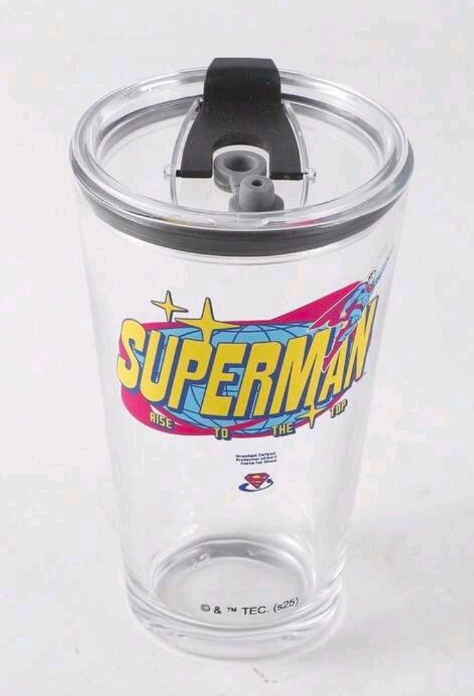 Clear Superman glass tumbler with black lid and front logo