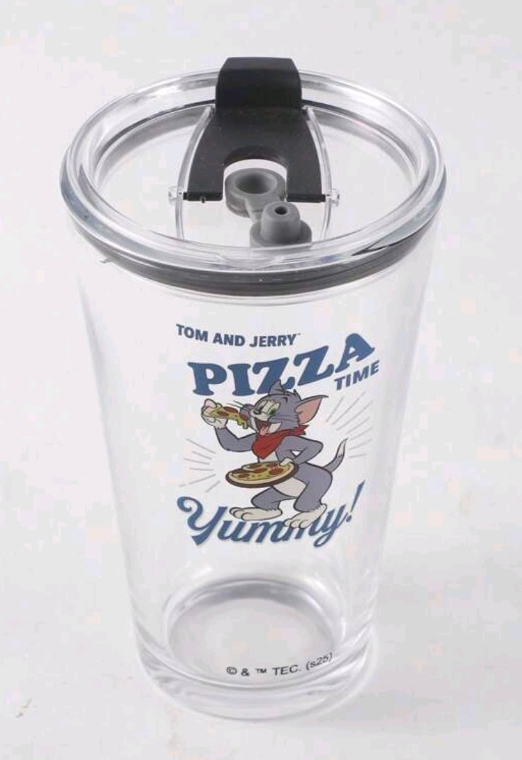Clear glass tumbler with black lid; top view shows straw opening