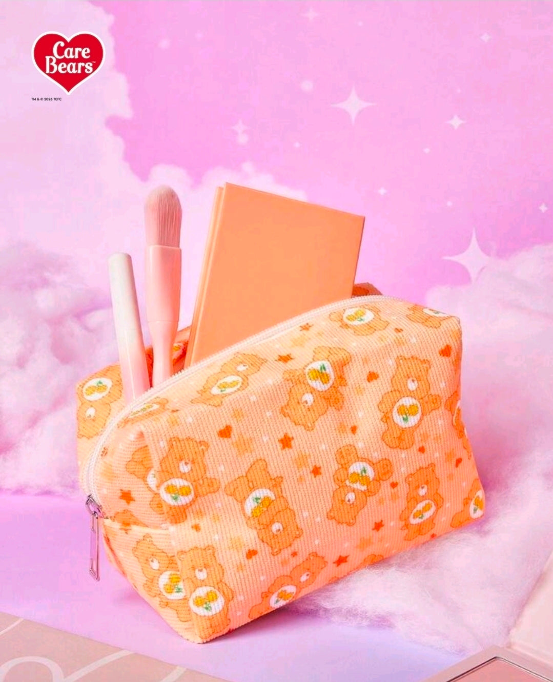 Orange corduroy zippered makeup organizer bag holding brushes and cards