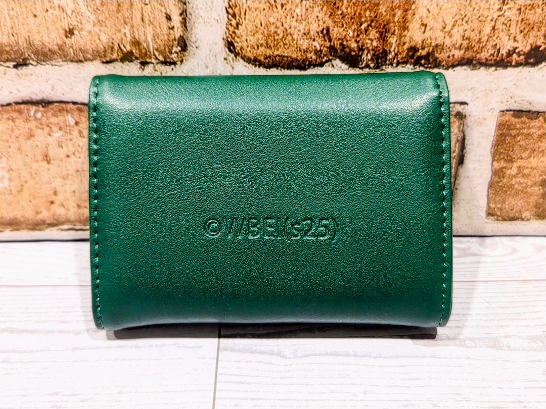 Green faux leather wallet back with ©WBEI(25) stamp, stitched border