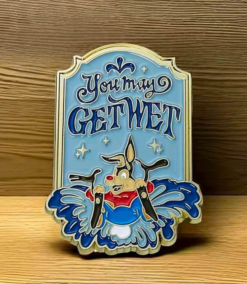 Enamel lapel pin with blue “Y’know Get Wet” sign and Br’er Rabbit silhouette