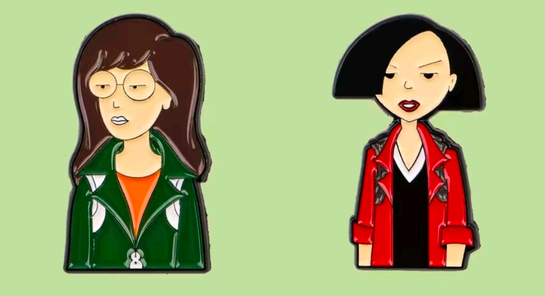 Two enamel character pins: Jane in green jacket; woman in a red blazer.