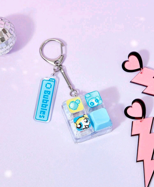 Blue fidget keychain with keyboard clicker charm and clear character block fidget pieces