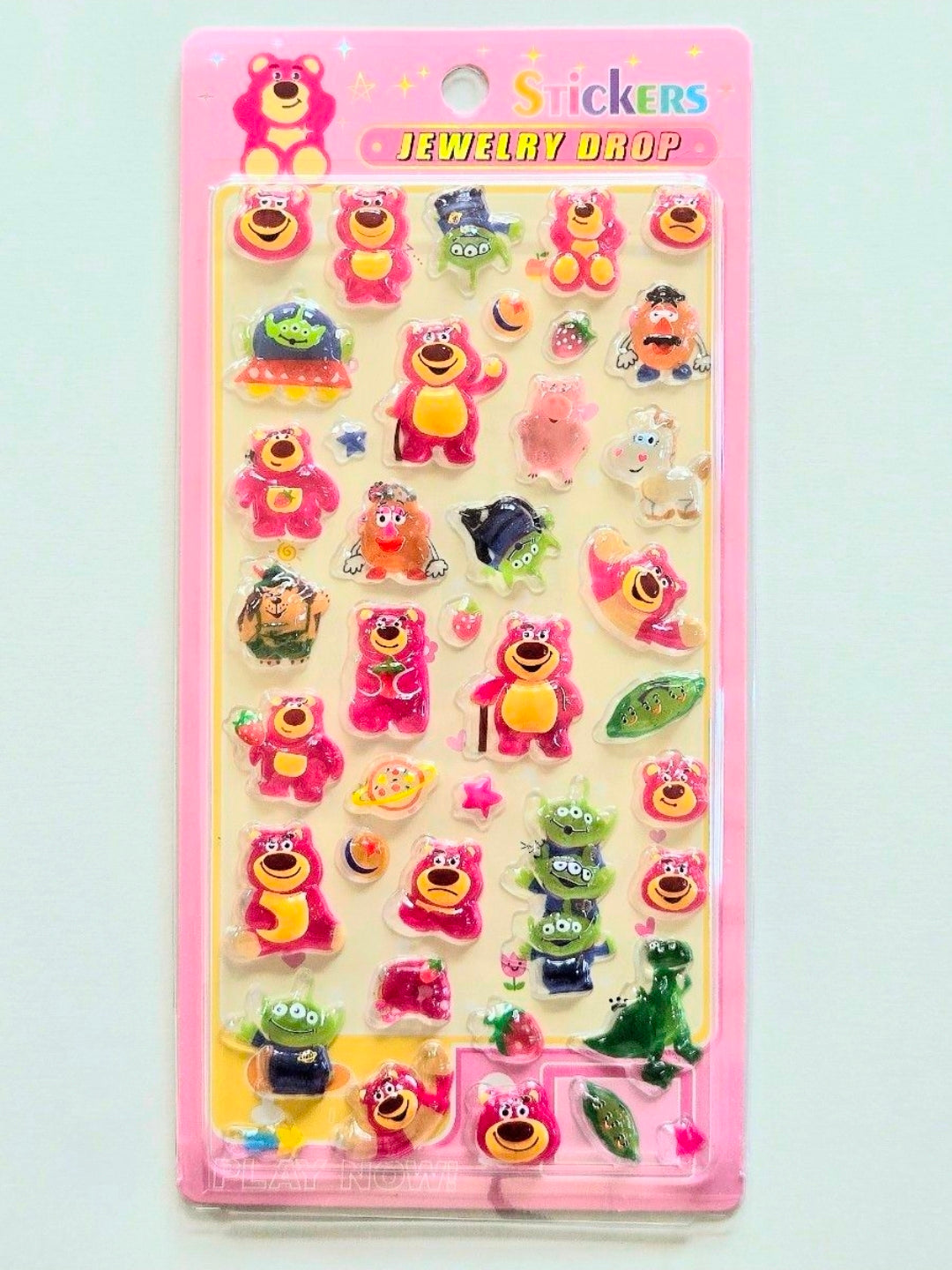3D acrylic sticker sheet on pink backing with assorted colorful character stickers