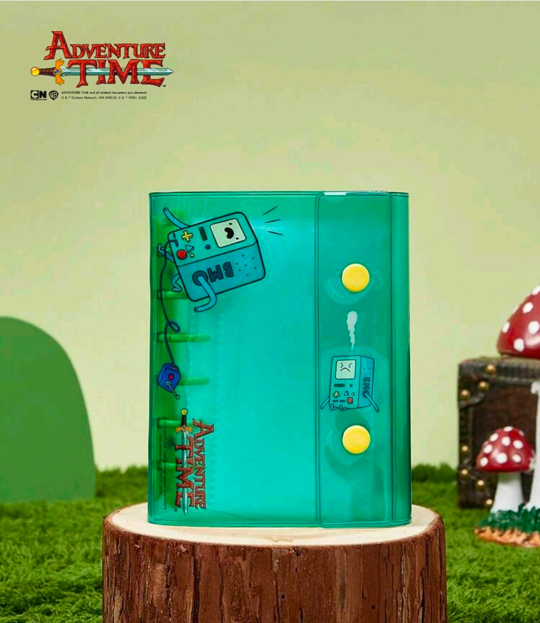 Green A7 mini binder with side pocket and BMO controller charm graphic.