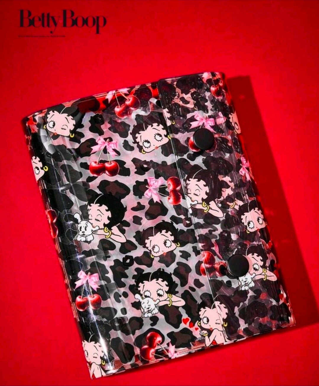 Betty Boop PVC 6-ring binder angled view, black leopard print cover with ring