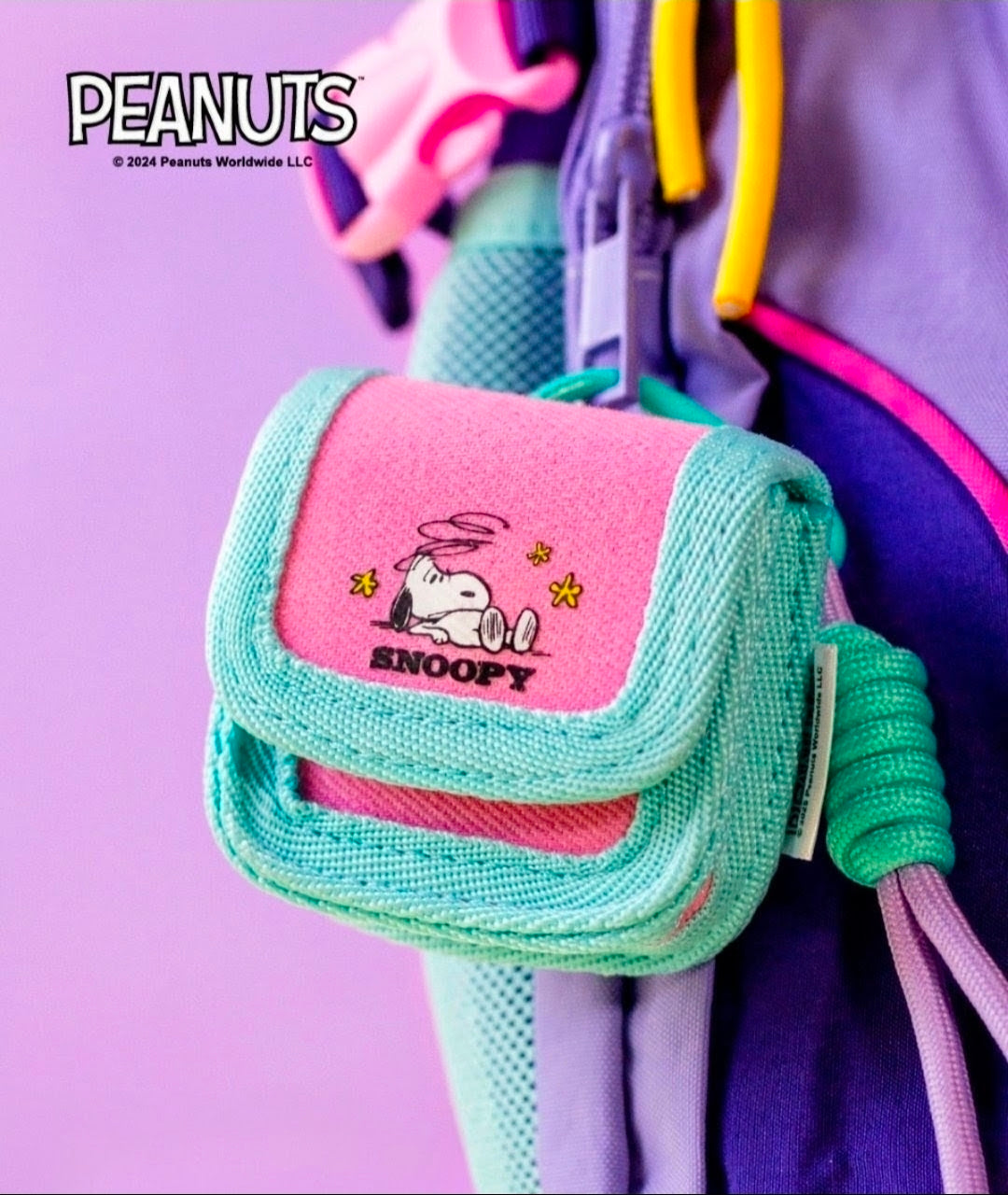 Colorful canvas earbud case with flap, teal and pink, Snoopy character patch
