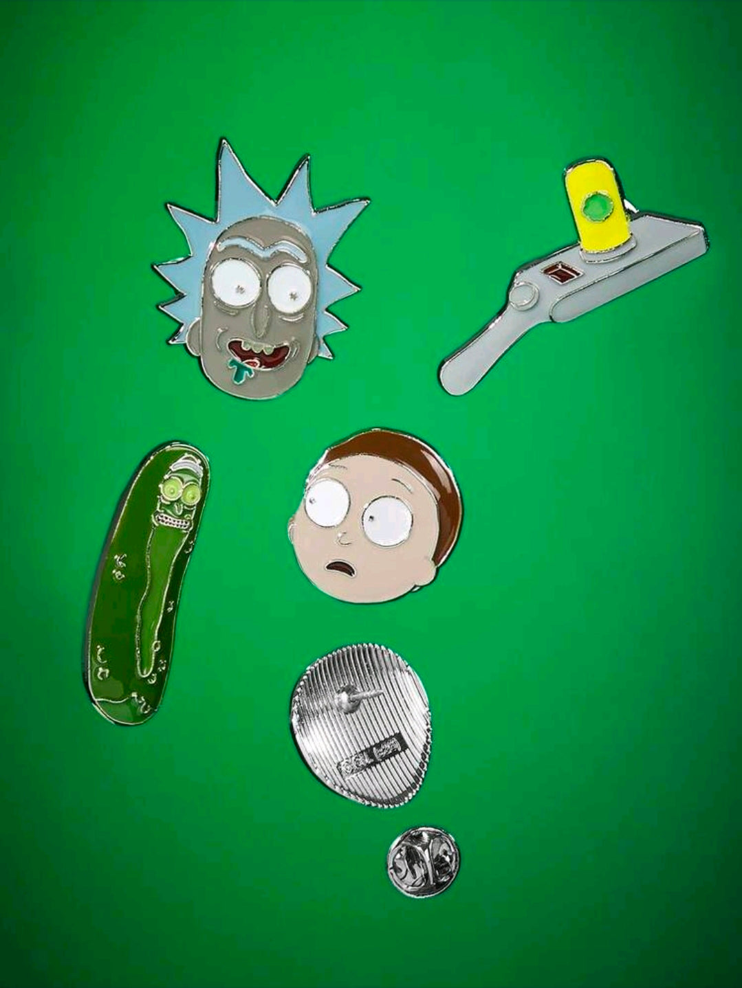 Five enamel character pins: Rick head, portal gun, pickle Rick, Meeseeks face, blue portal