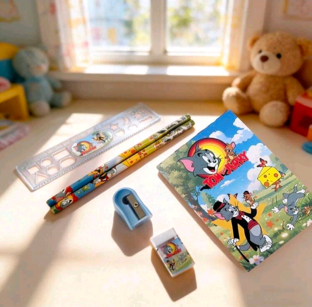 Tom & Jerry stationery gift set with pencil, notepad, eraser, and ruler on table