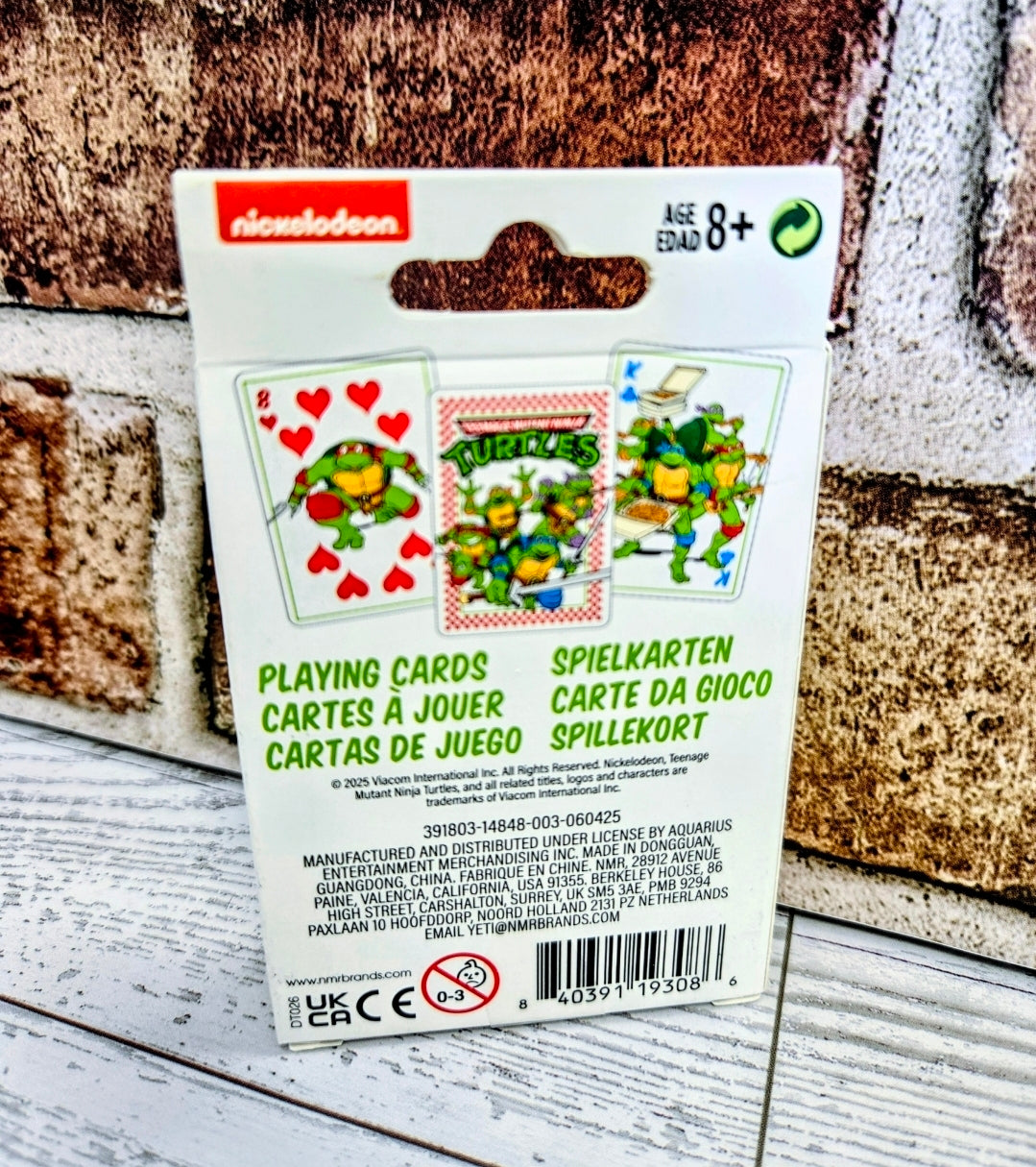 Teenage Mutant Ninja Turtles playing cards deck back with age 8+ and multilingual text