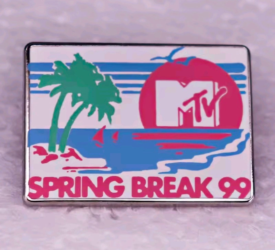 Rectangular Spring Break 99 enamel pin featuring palm trees and pink MTV badge graphic