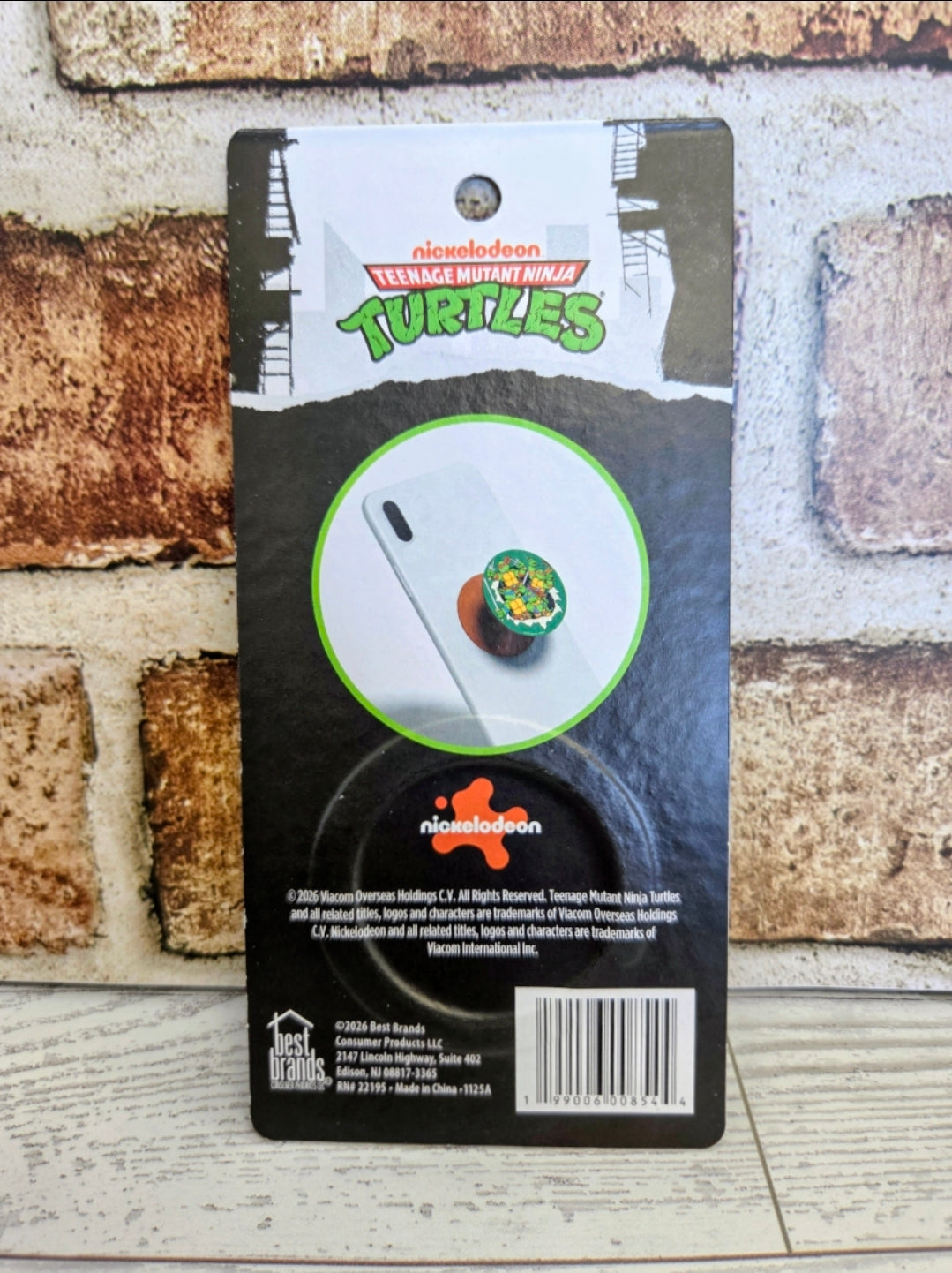 Teenage Mutant Ninja Turtles phone grip holder back with barcode and text