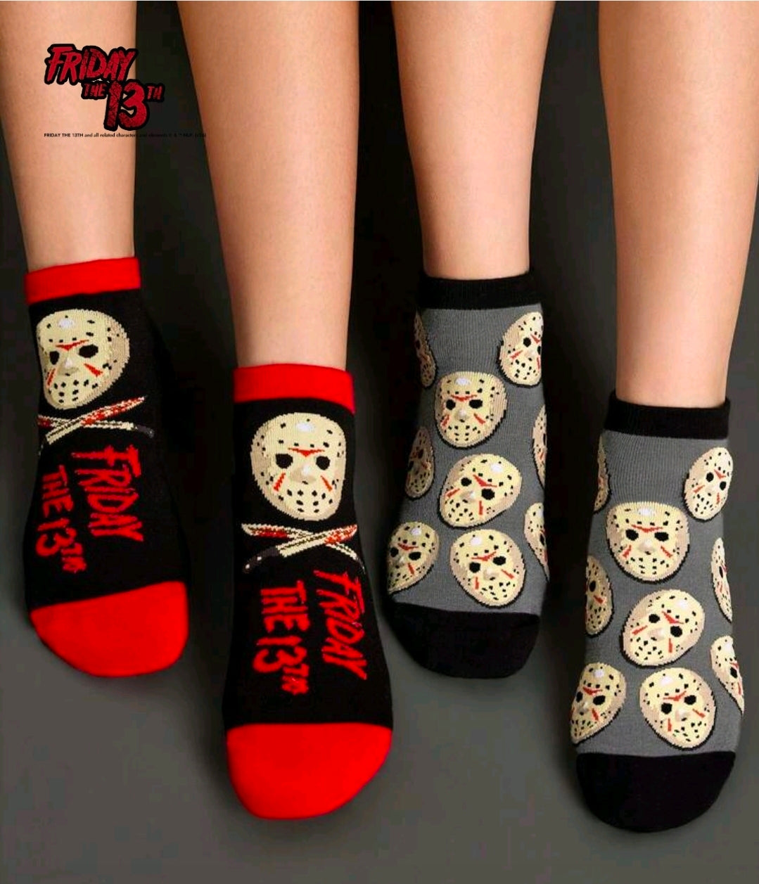 Two pairs of ankle socks with Jason hockey mask prints and red “Friday the 13th” text