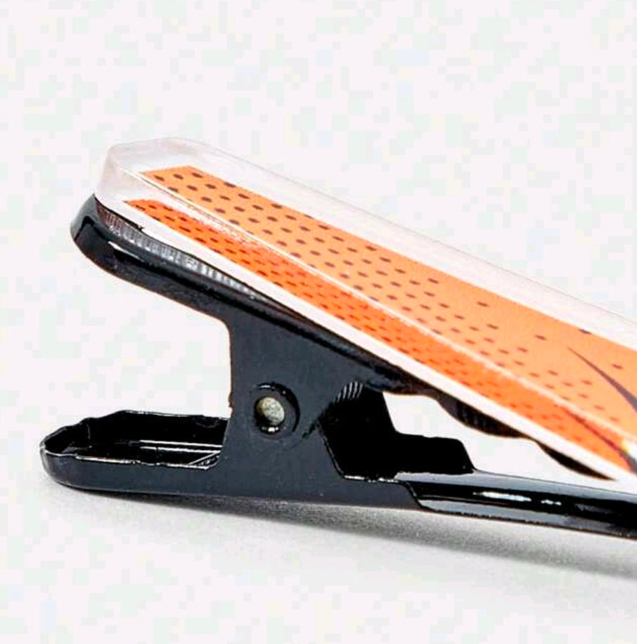 Satin hair clip with Tom & Jerry print, black clasp, orange pattern panel
