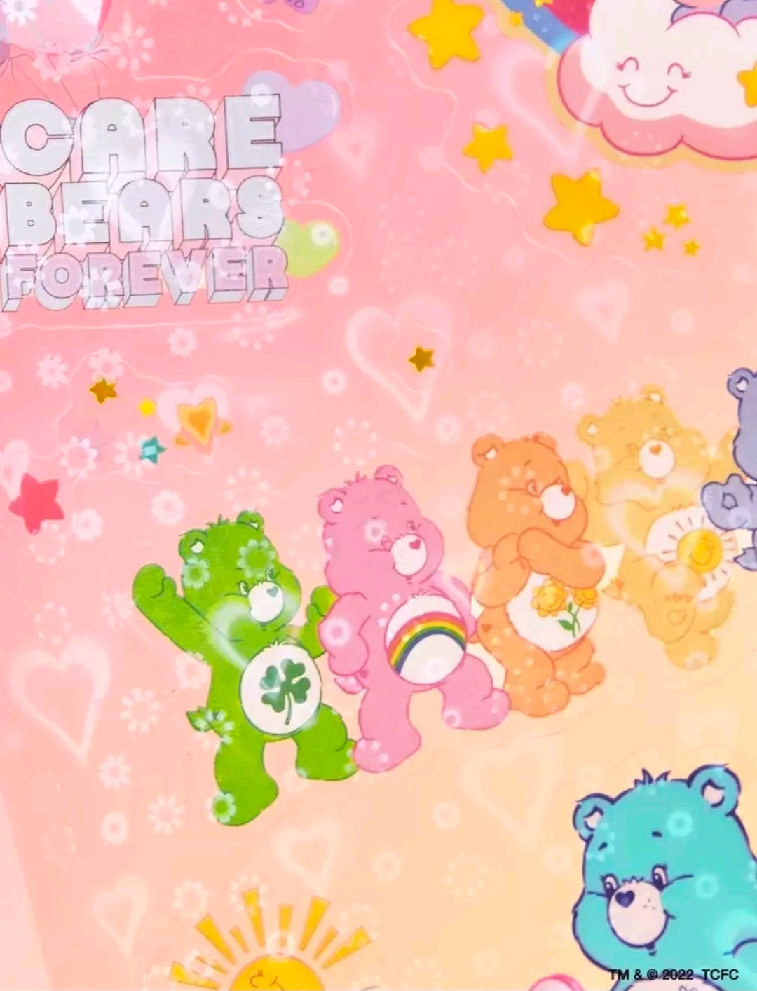 Holographic Care Bears sticker cluster with rainbow bear icons, hearts, and star sparkles