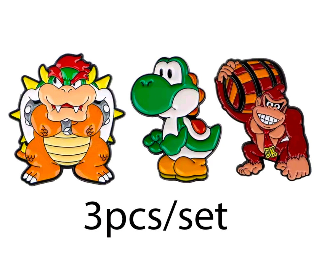 Three-piece enamel pin set featuring Bowser, Yoshi, and Donkey Kong characters