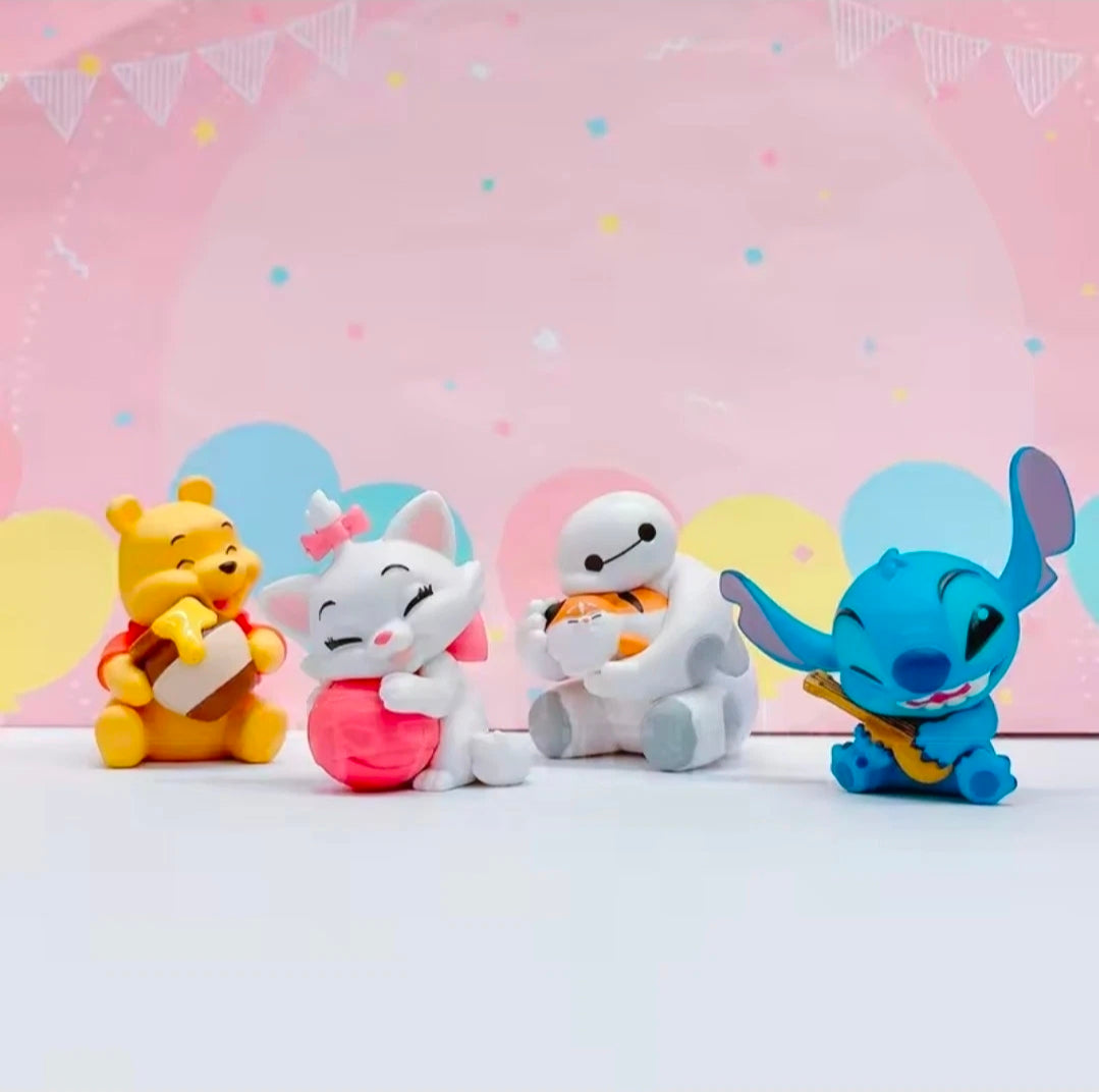 Group photo of four Disney plush figures: Stitch, Winnie the Pooh, a white robot, and Marie