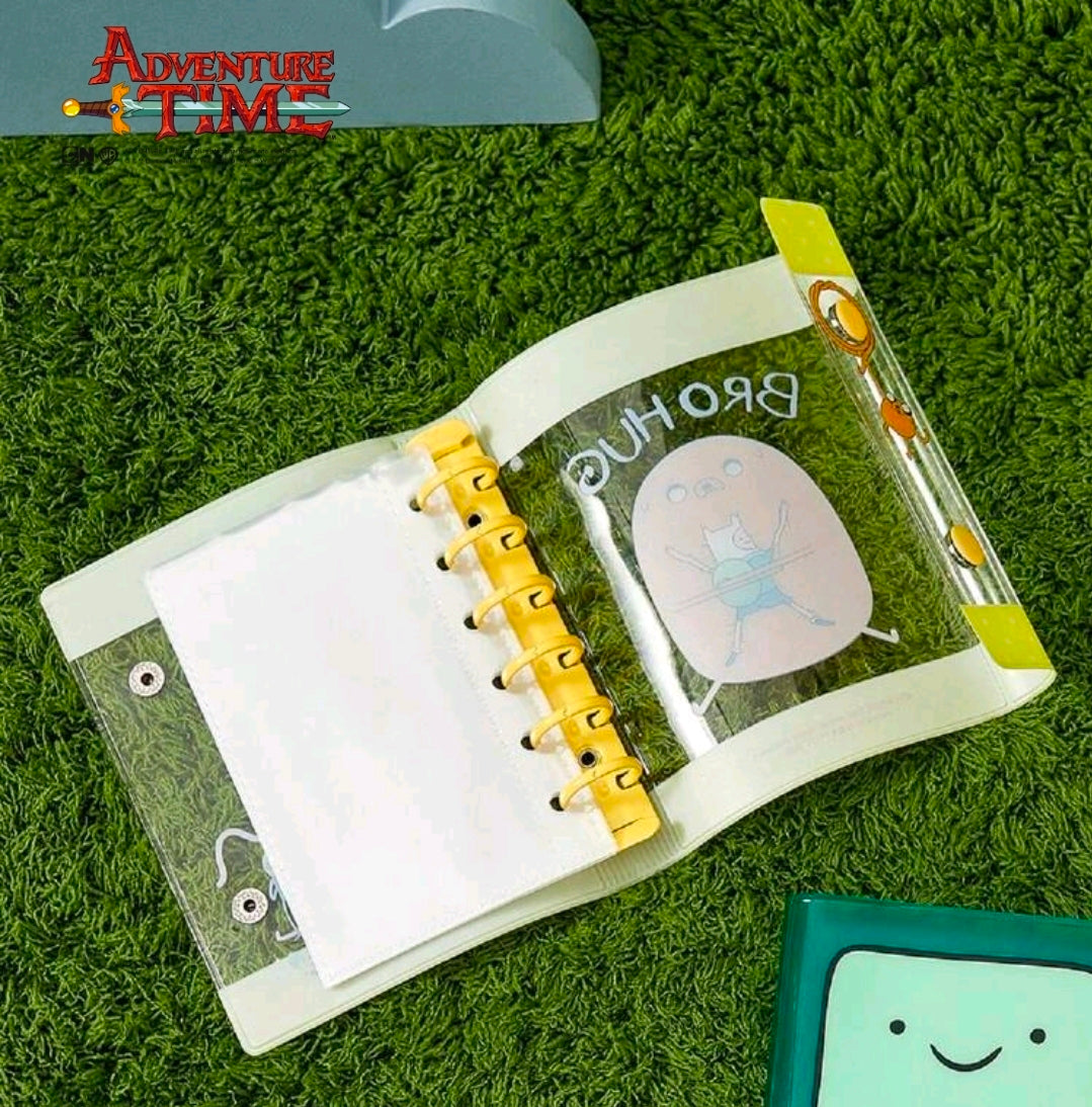Open mini binder sticker album with yellow rings and illustrated sticker pages