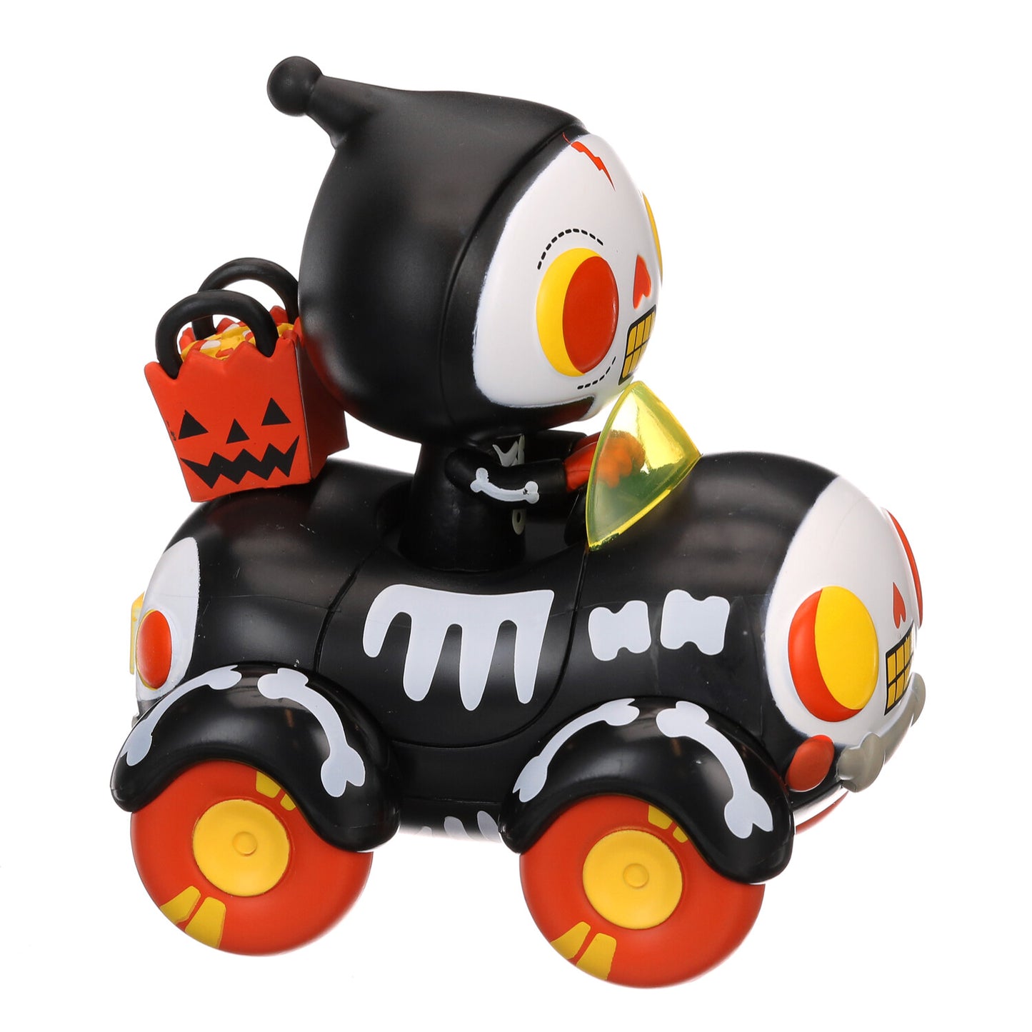 Three-quarter view of black-and-white skull buggy figure with orange wheels and jack-o-bag