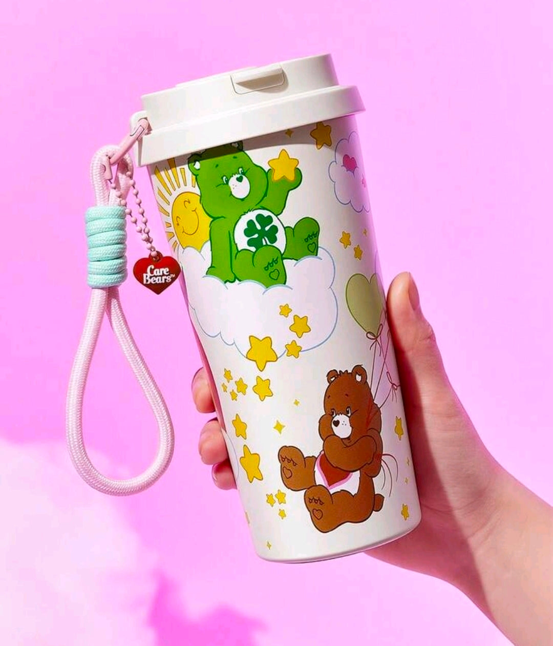Care Bears insulated stainless tumbler with white lid, pink straw? and wrist strap