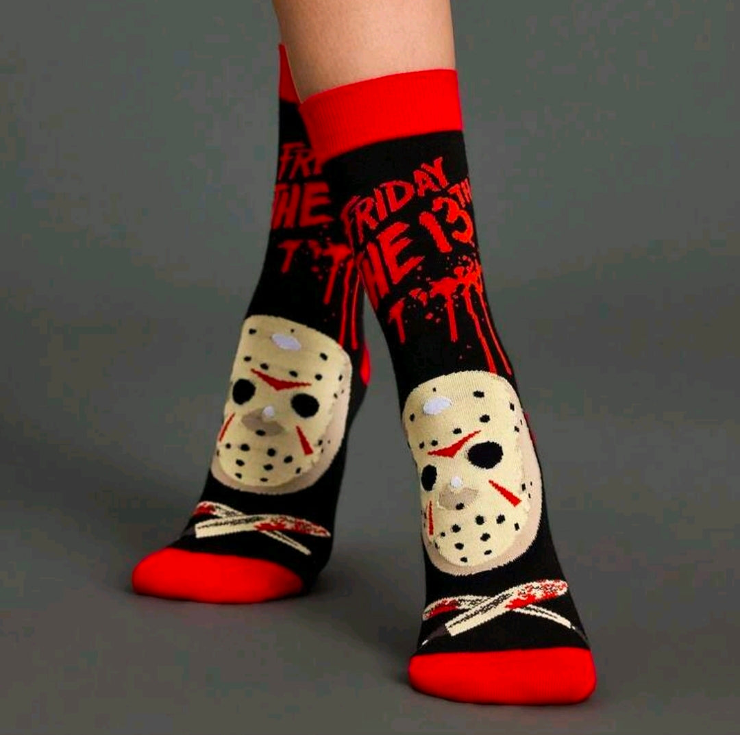 Black crew socks with red cuffs and white hockey-mask graphic