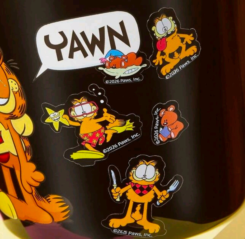 Clear-backed Garfield character sticker sheet with multiple cartoon stickers and faces