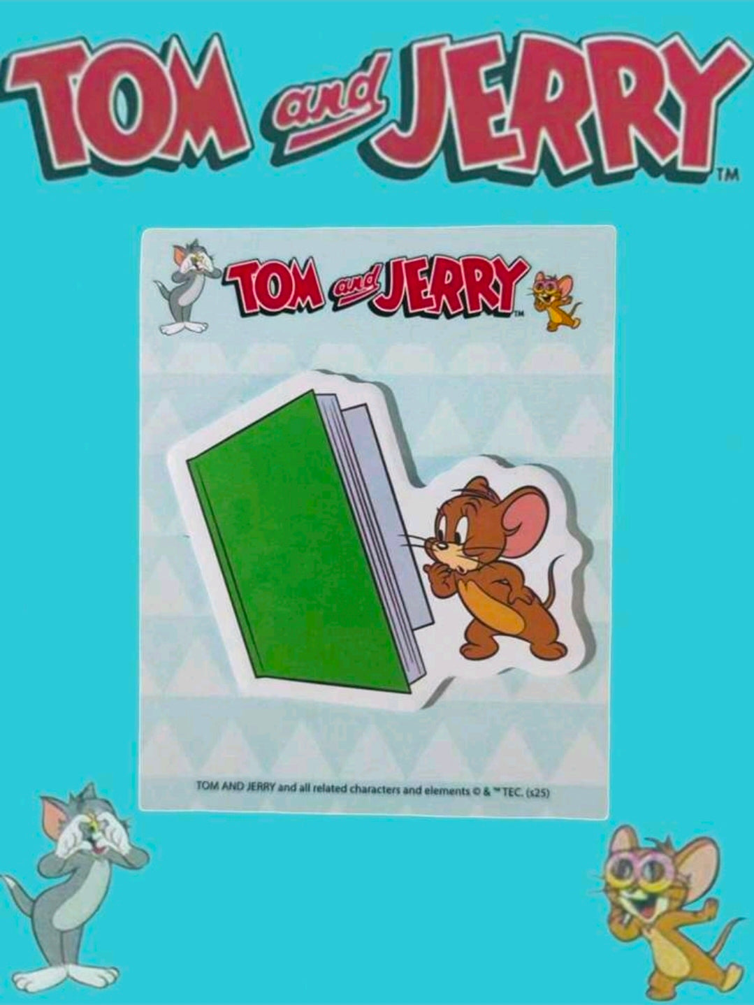 Tom and Jerry sticky note pad in packaging with green die-cut note and character art
