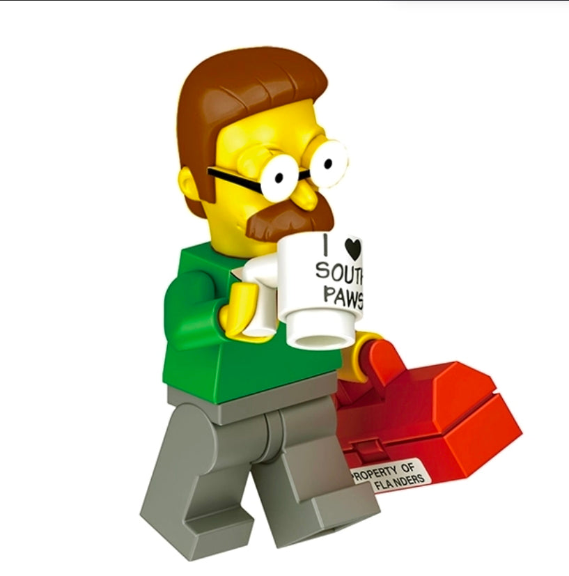 Ned Flanders mini brick figure with green shirt, white mug, and red accessory
