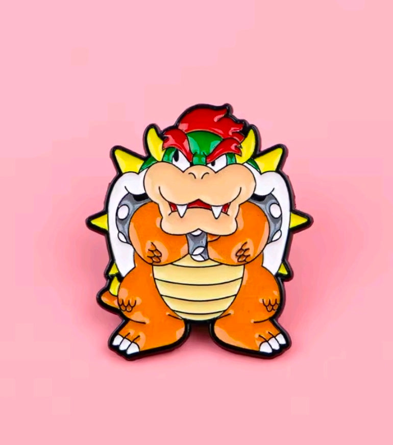 Bowser enamel character pin with green spiked shell and red hair, front-facing