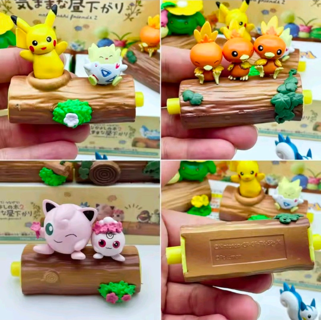 Re-Ment Pokémon blind box figures with mini characters on a log base